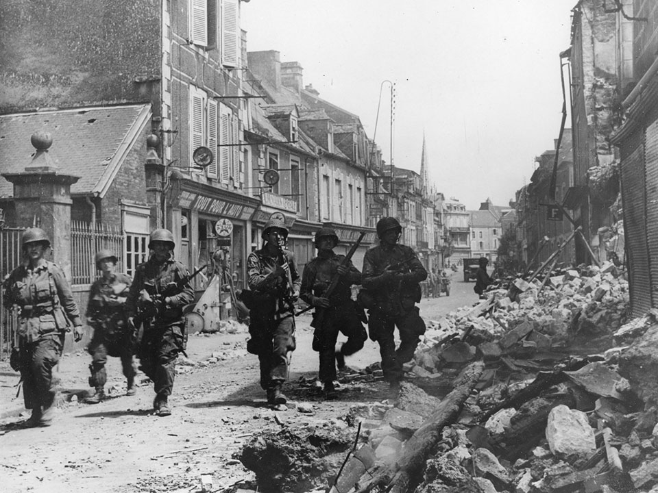 Paratroopers Move Through Carentan